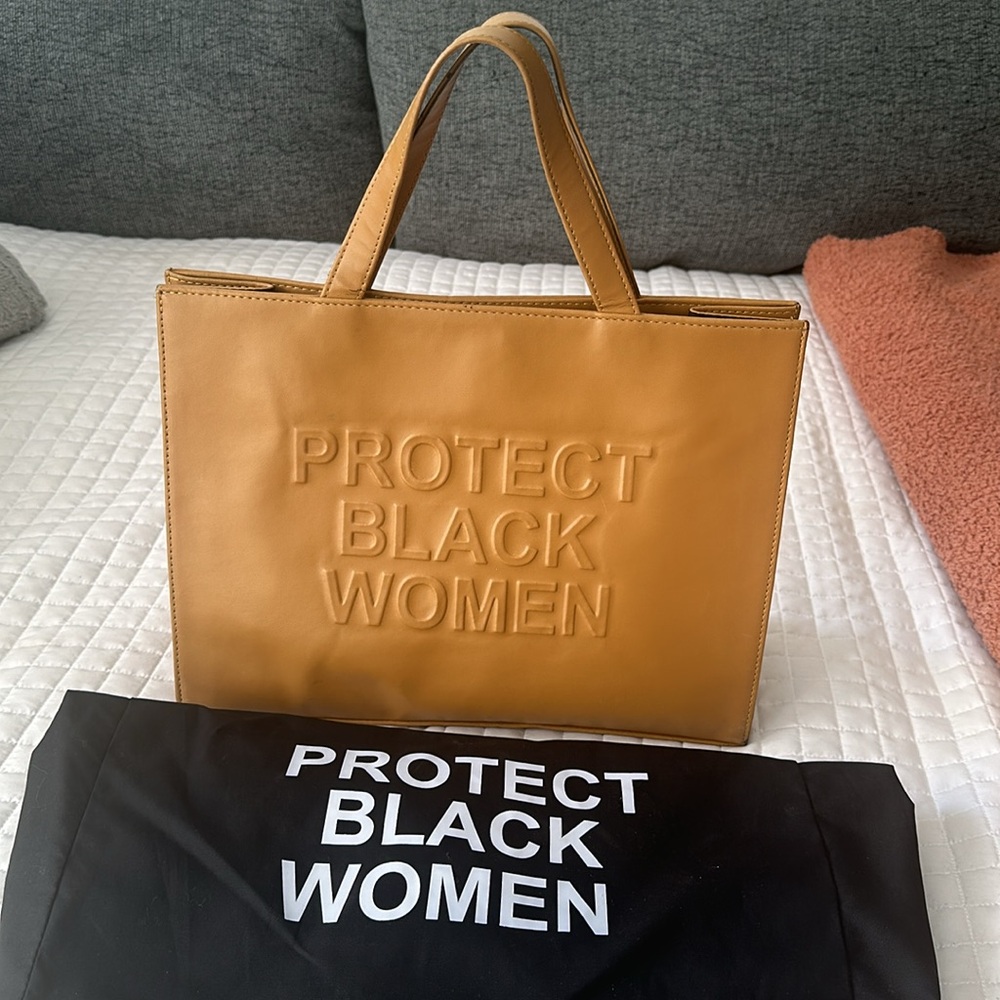 Beautiful CISE “Protect Black Women” bag w/shoulder strap. Never Carried!